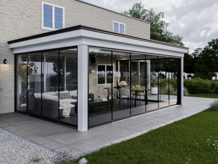 Overkapping glazen schuifwand tuin